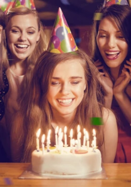 Birthday Girls celebrate birthday with cake